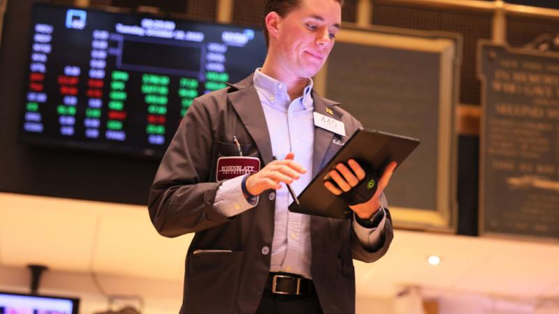 A trader on the floor of the New York Stock Exchange, Oct. 18