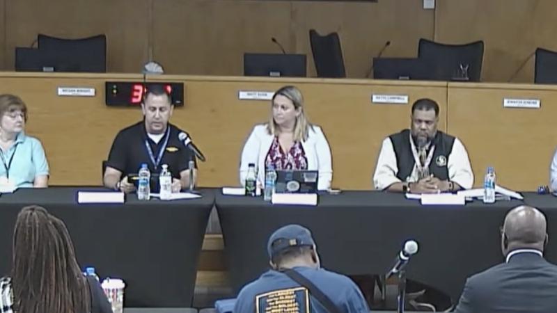 A scene from the school board meeting