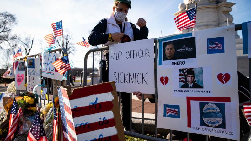 A memorial to Officer Brian Sicknick, Jan. 10, 2021