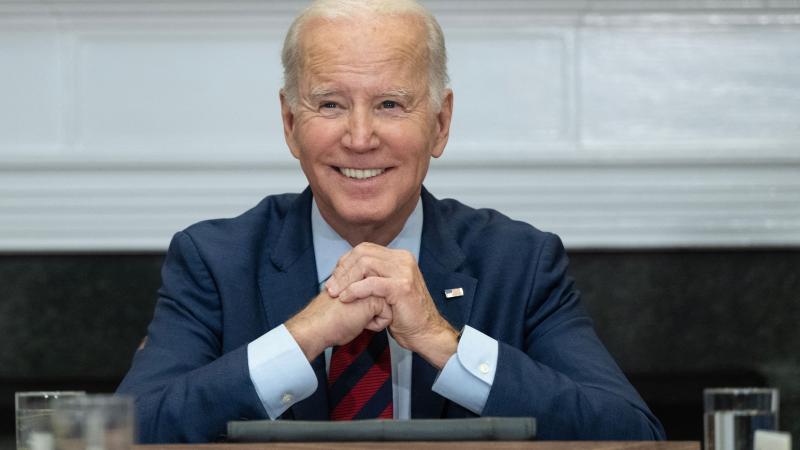 Joe Biden poses for photo 
