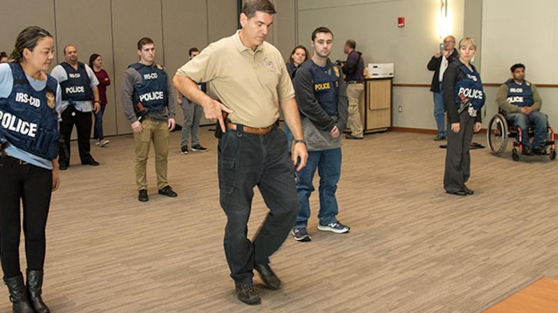 IRS supervisory special agent Rob Erickson, Stockton University students, Oct. 30, 2017, Galloway, N.J.