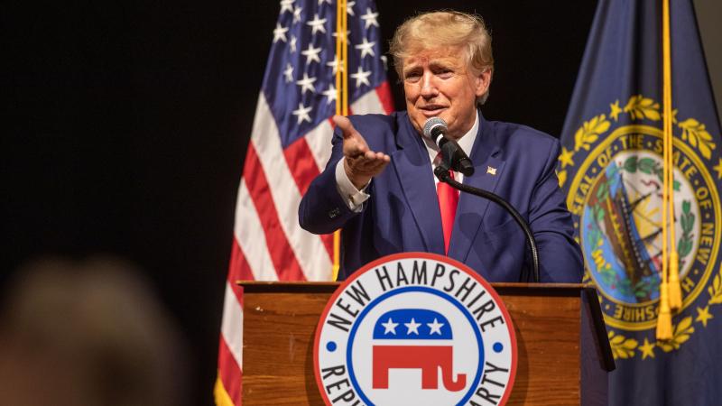 Trump speaks from podium at state GOP gathering