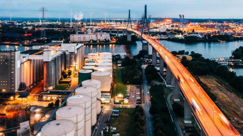 An aerial view of an industrial zone / power station at night