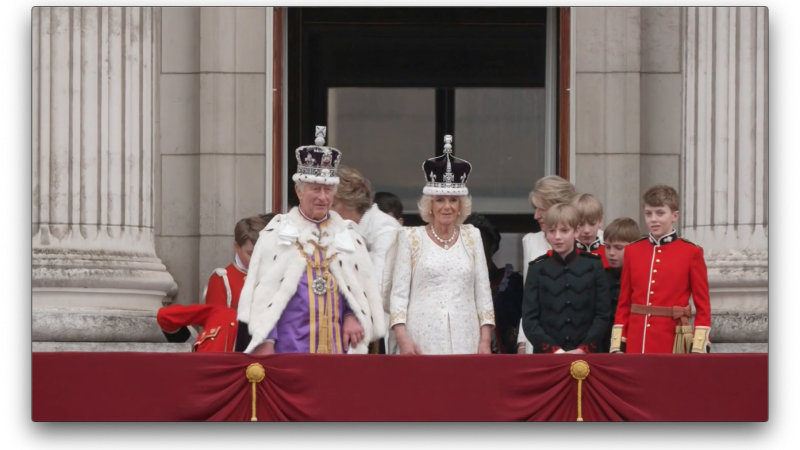 Royal family greets the crowd on the balcony at Buckingham Palace