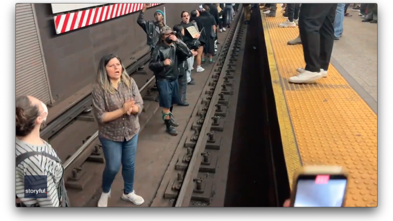 Protestors demonstrate on subway tracks following Jordan Neely death