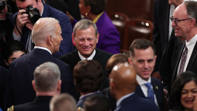 Chief Justice John Roberts with President Biden