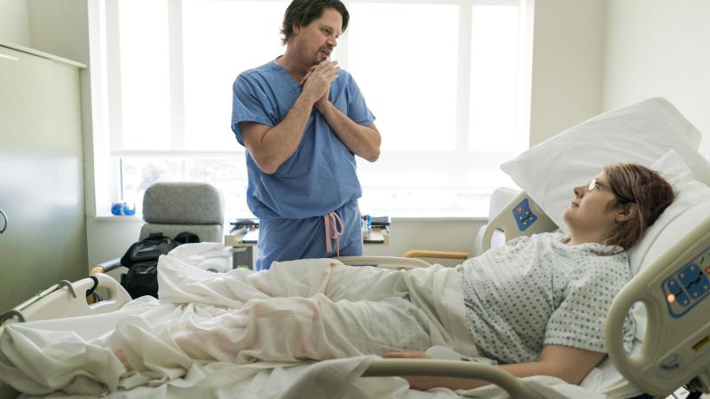 Dr. Geoffrey Stiller visits a patient, Sarah Bergman, who he recently performed a vaginoplasty surgery