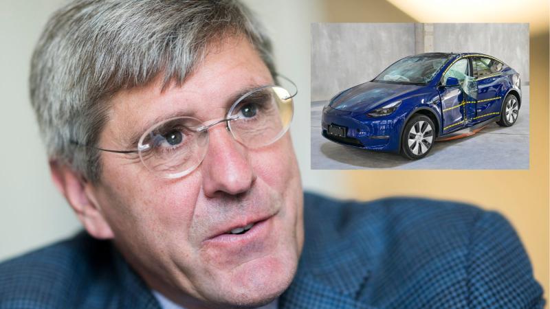 Stephen Moore and an electric car