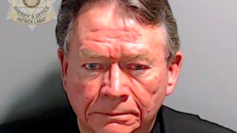 In this handout provided by the Fulton County Sheriff's Office, Lutheran pastor Stephen Cliffgard Lee poses for his booking photo at the Fulton County Jail on August 25, 2023 in Atlanta, Georgia.