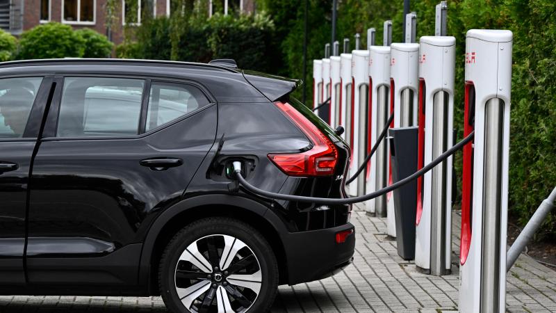 An electric car charges at a charging point reserved for Tesla cars in Breda on September 19, 2023. (Photo by JOHN THYS / AFP) (Photo by JOHN THYS/AFP via Getty Images)