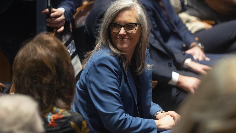 Arizona Gov. Katie Hobbs sits in the audience prior to President Joe Biden's remarks at the Tempe Center for the Arts on September 28, 2023 in Tempe, Arizona.