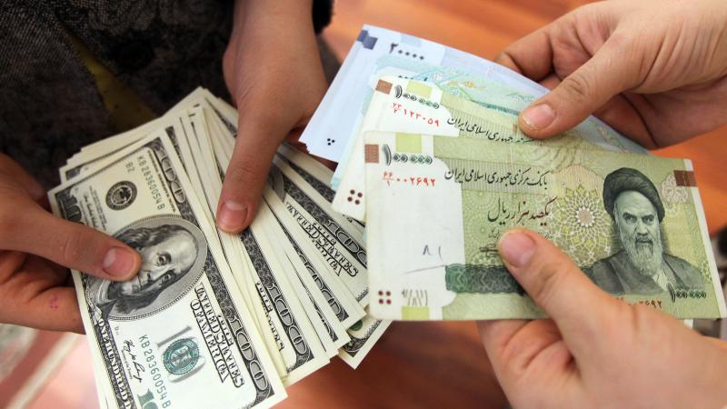 Iranian rials, U.S. dollars, Tehran, Iran, Jan. 12, 2012