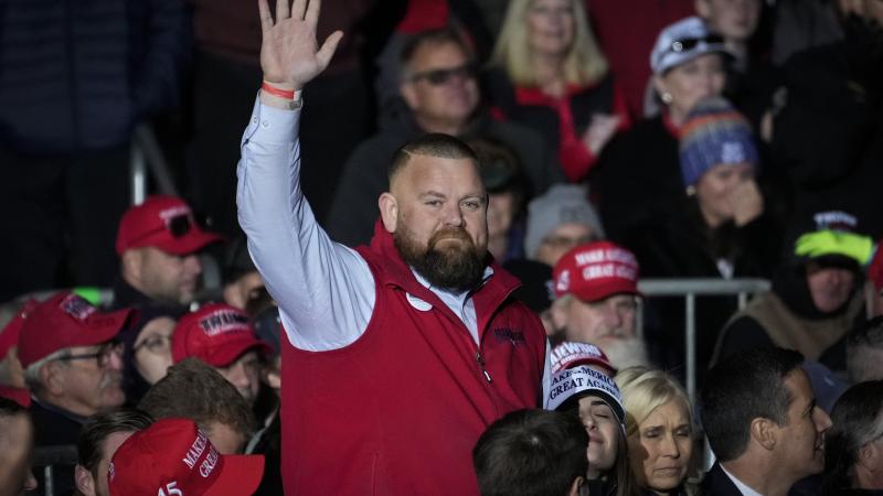 Republican Congressional candidate J.R. Majewski acknowledges the crowd after being introduced by former President Donald Trump at a rally for Ohio Republicans at the Dayton International Airport on November 7, 2022 in Vandalia, Ohio.