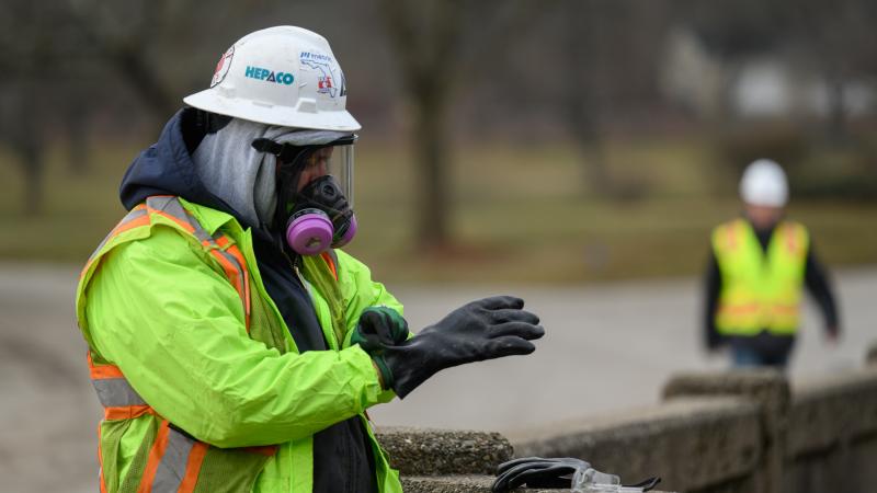 Contractors are cleaning up and testing Sulphur Run, a creek that runs from the derailment site through the center of East Palestine, Ohio
