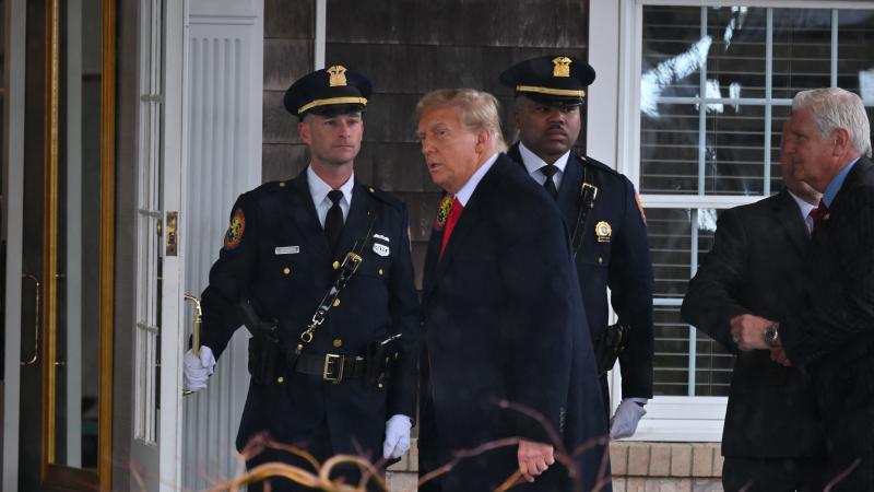 Donald Trump attends the wake of slain NYPD officer