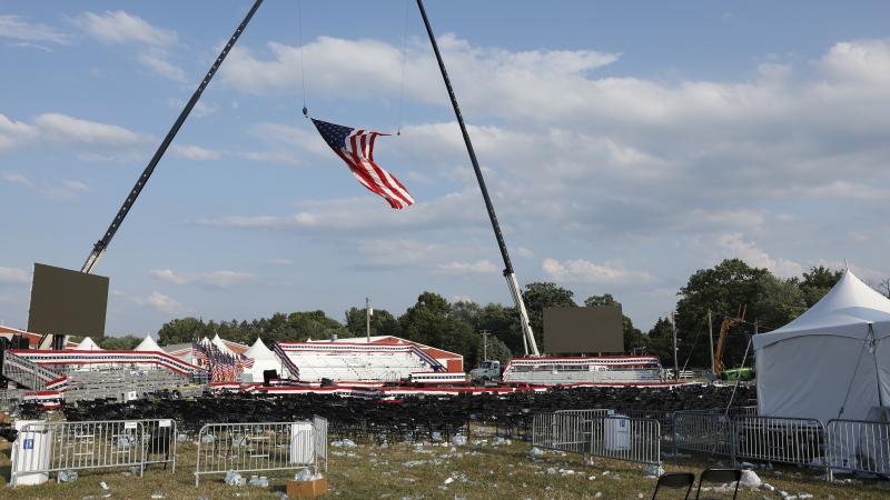 BUTLER, PENNSYLVANIA - JULY 13: Campaign signs and empty water bottles are seen on the ground of a campaign rally for Republican presidential candidate former President Donald Trump on July 13, 2024 in Butler, Pennsylvania. According to Butler County District Attorney Richard Goldinger, the suspected gunman is dead after injuring former President Trump, killing one audience member and injuring at least one other. (Photo by Anna Moneymaker/Getty Images)