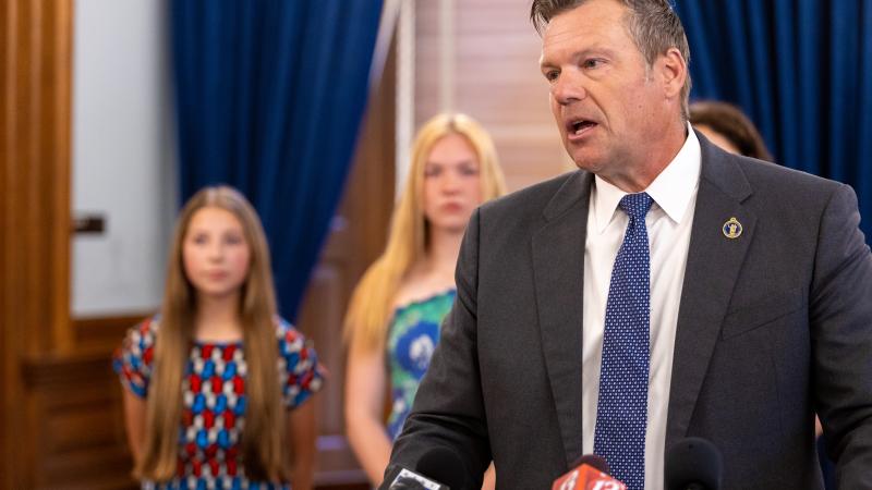 Kansas Attorney General Kris Kobach with Female Athletes United members