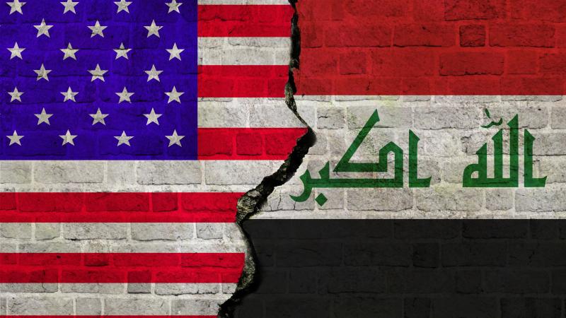 Flag of United States of America and Iraq together. The US-Iraq conflict