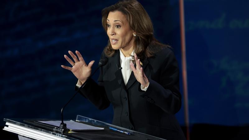 Democratic presidential nominee, U.S. Vice President Kamala Harris, debates Republican presidential nominee, former U.S. president Donald Trump, for the first time during the presidential election campaign at The National Constitution Center on September 10, 2024 in Philadelphia, Pennsylvania.