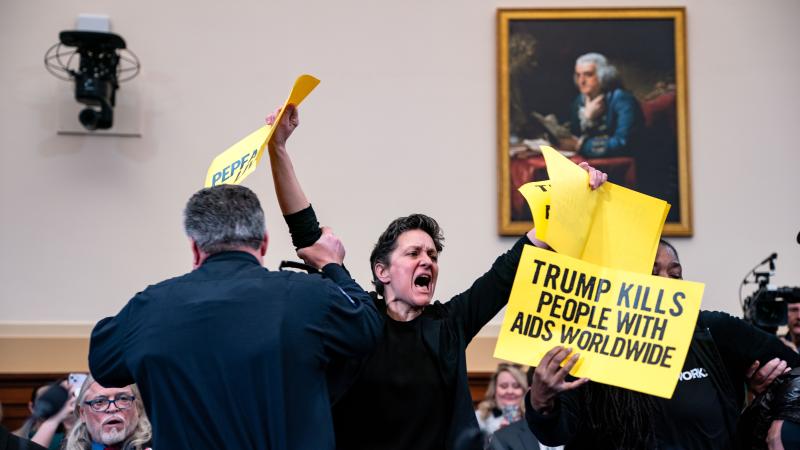 Protest at House Foreign Affairs Committee hearing