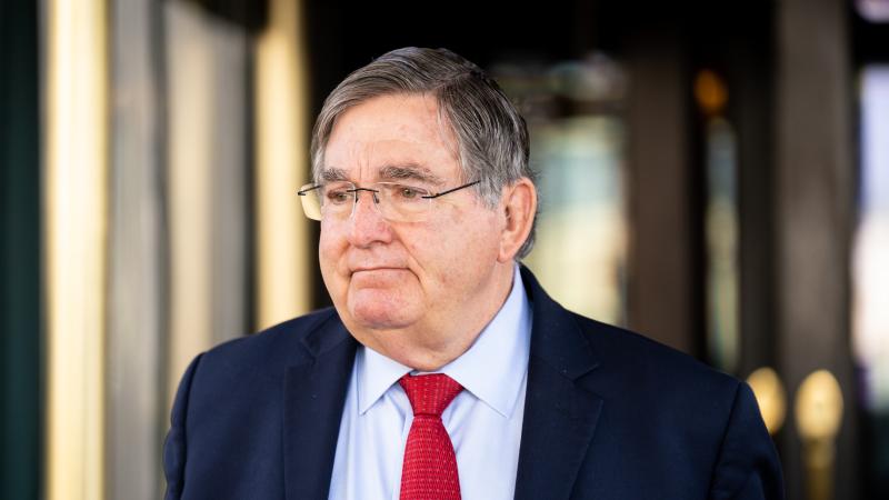 Rep. Michael Burgess, R-Texas, leaves the House Republican Conference caucus meeting at the Capitol Hill Club in Washington on Wednesday, April 27, 2022