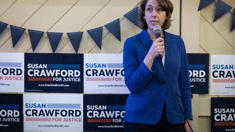 Dane County Circuit Court Judge Susan Crawford, candidate for the Wisconsin Supreme Court, speaks to supporters during a campaign stop at the Racine County Democratic Party headquarters on March 23, 2025 in Racine, Wisconsin.