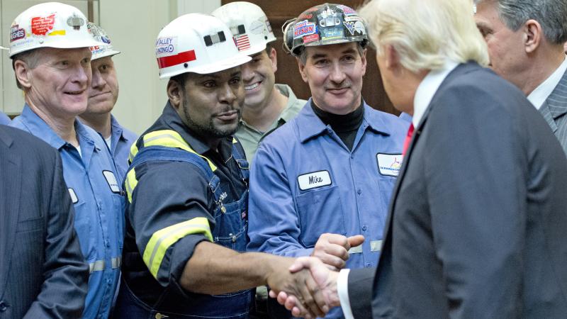 Trump with miners