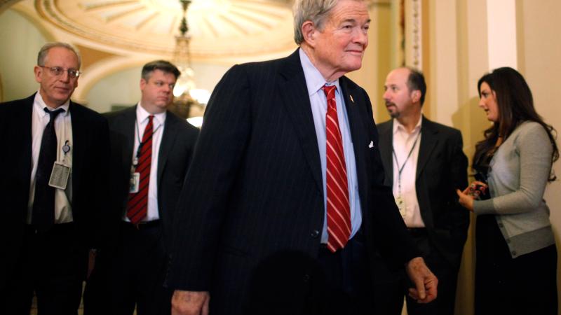 Sen. Christopher "Kit" Bond (R-MO) (C) heads for a closed session of the Senate about the new START Treaty, a ratification of a nuclear-arms treaty with Russia, in the U.S. Capitol December 20, 2010 in Washington, DC.