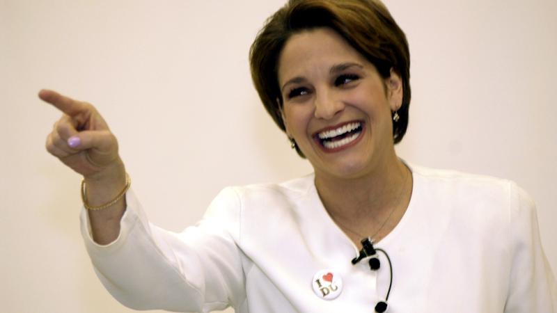 Mary Lou Retton smiles during a speech to a group at the University of Denver before a gymnastics meet among DU, Air Force and Arizona State.