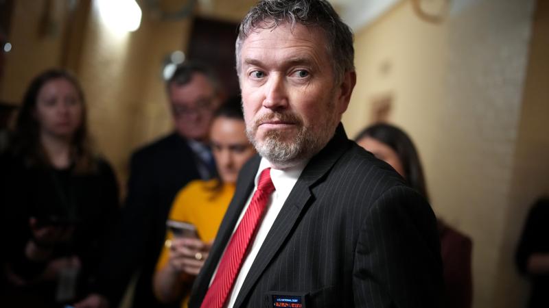 U.S. Rep. Thomas Massie (R-KY) speaks to reporters as she arrives for a House Republican caucus meeting at the U.S. Capitol on February 25, 2025.