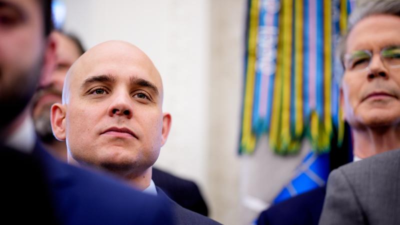 White House Deputy Chief of Staff for Legislative, Political, and Public Affairs James Blair (L) and Treasury Secretary Scott Bessent (R) attend a swearing-in ceremony in the Oval Office at the White House on March 28, 2025 in Washington, DC. U.S. President Donald Trump hosted the swearing in of his former personal attorney and White House Presidential counselor Alina Habba as interim U.S. Attorney in New Jersey.