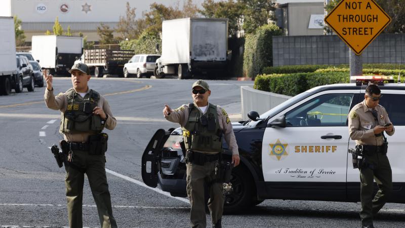 L.A. County Sheriff's deputies outside the Biscailuz Center Academy Training center, where three deputies were killed during a training accident on Friday morning, July 18, 2025. 