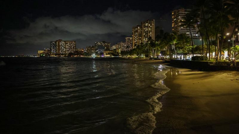 Waves roll on to an empty Waikiki Beach on July 29, 2025 in Honolulu, Hawaii.