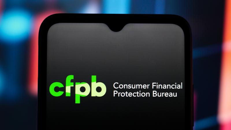 In this photo illustration, the Consumer Financial Protection Bureau (CFPB) logo is seen displayed on a smartphone screen