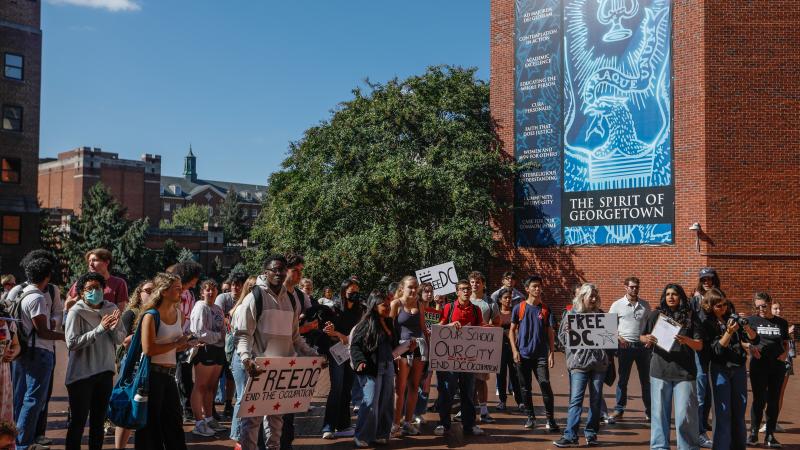 Students stage a walkout at Georgetown University to protest the deployment of National Guard troops, on September 9, 2025, in Washington DC