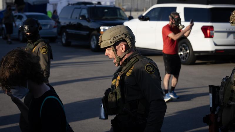 U.S. Border Patrol Chief Greg Bovino leads his troop as they confront demonstrators outside of an immigrant processing center on September 27, 2025 in Broadview, Illinois