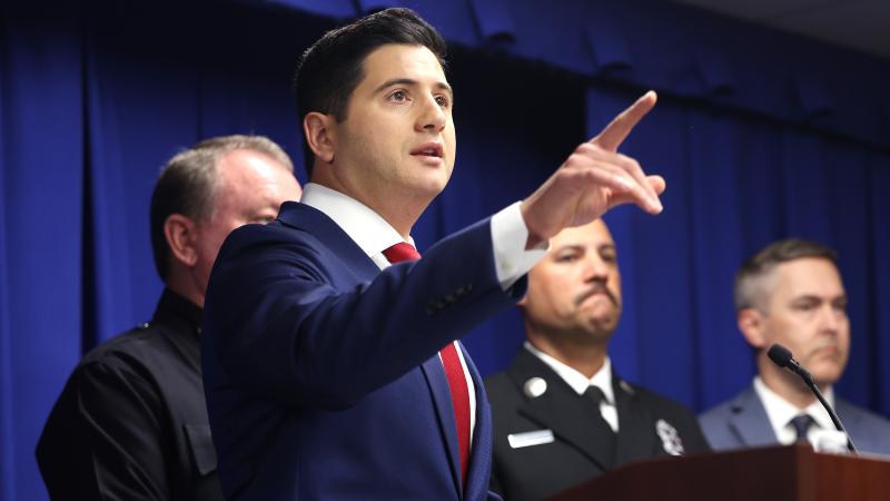 Acting United States Attorney Bill Essayli takes questions from the press during a news conference
