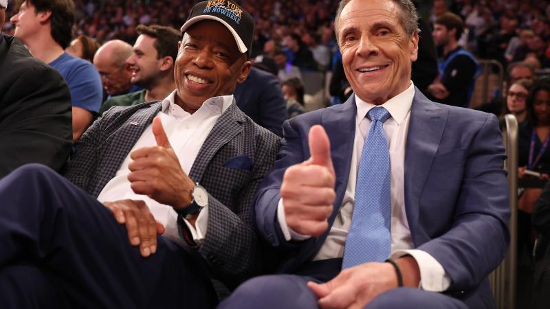 New York Mayor Eric Adams poses with Independent candidate former New York Gov. Andrew Cuomo after Cuomo participated in the second debate for the upcoming mayoral election on Wednesday evening during the game between the New York Knicks and the Cleveland Cavaliers at Madison Square Garden on October 22, 2025 in New York City.