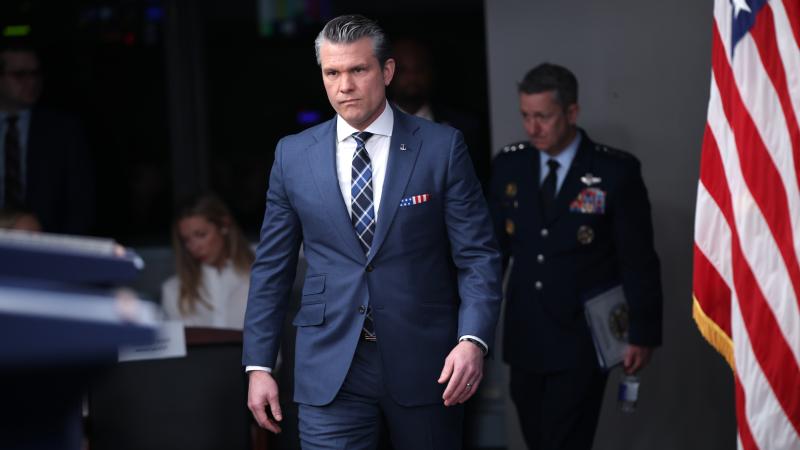 Pete Hegseth and Dan Caine