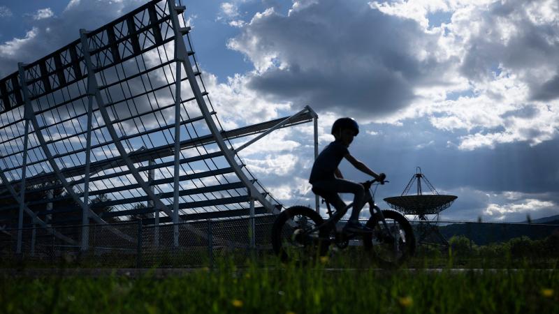he CHIME Outrigger telescope is seen with one of the original 185 Foot radio telescopes at the Green Bank Observatory i