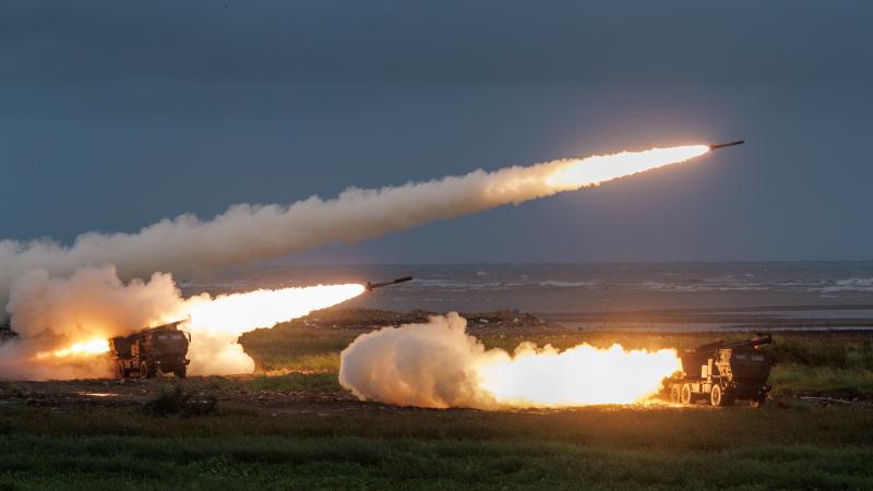 Taiwanese Army M142 High Mobility Artillery Rocket System (HIMARS) vehicles launch projectiles during a live-fire training exercise in Taichung on June 10, 2026.