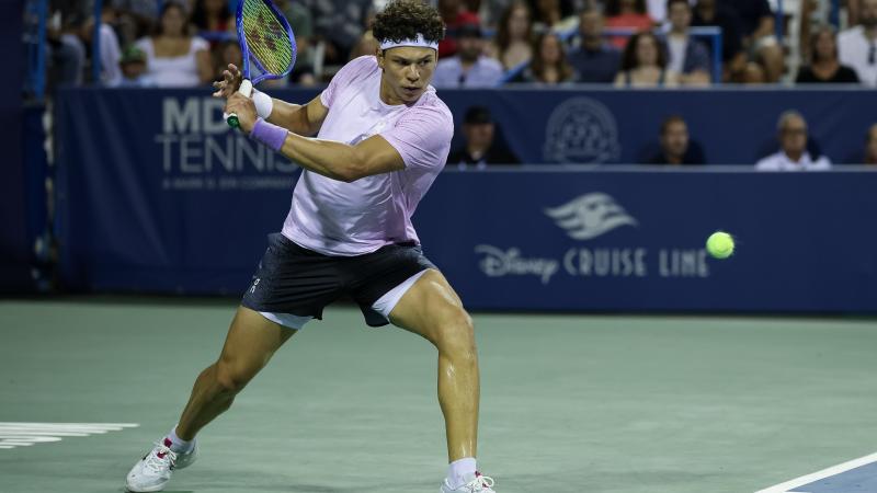 Ben Shelton returns a shot against Frances Tiafoe of the United States during the men's singles match on day 5 of the Mubadala Citi DC Open 2025
