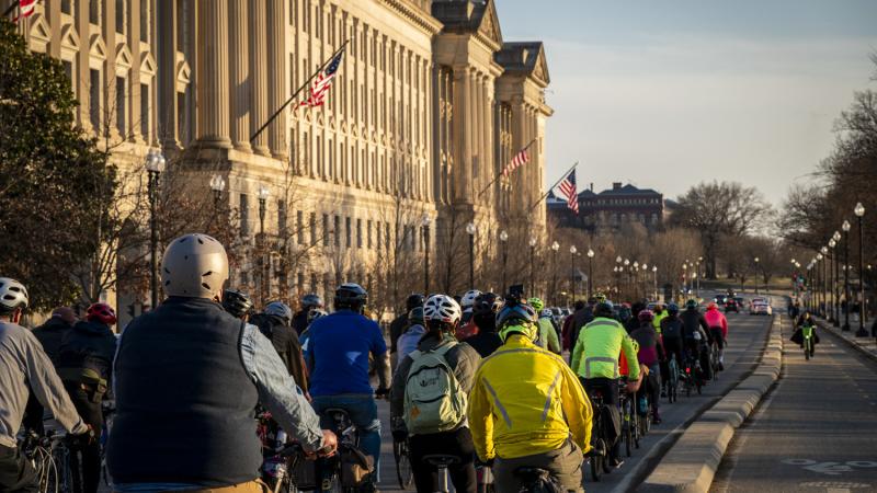 Cyclists gather to keep bike lane open