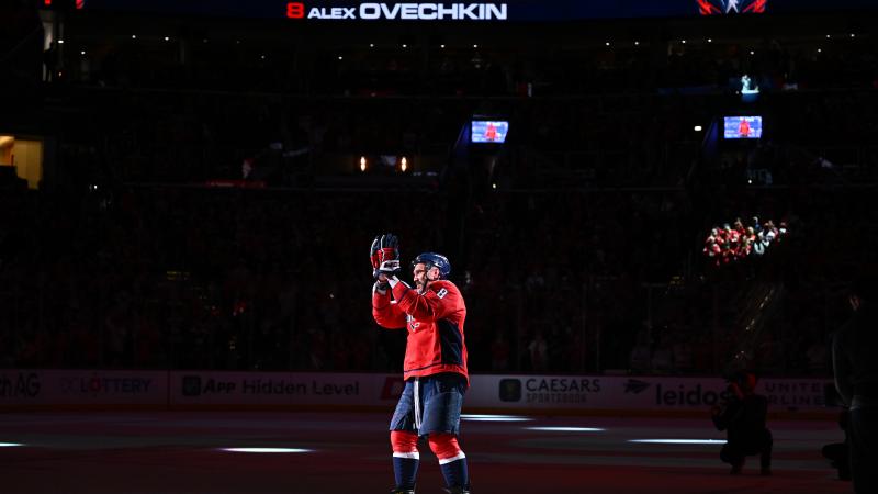 Alex Ovechkin #8 of the Washington Capitals claps for the crowd after being named First Star of the Game after defeating the Pittsburgh Penguins 3-0 on April 12, 2026