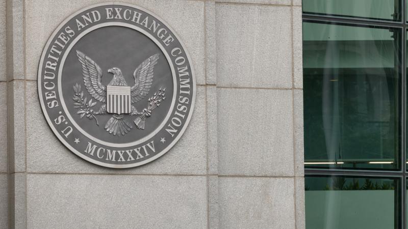 An emblem marks the entrance to the U.S. Securities and Exchange Commission headquarters building, May 26, 2026, in Washington, DC. 