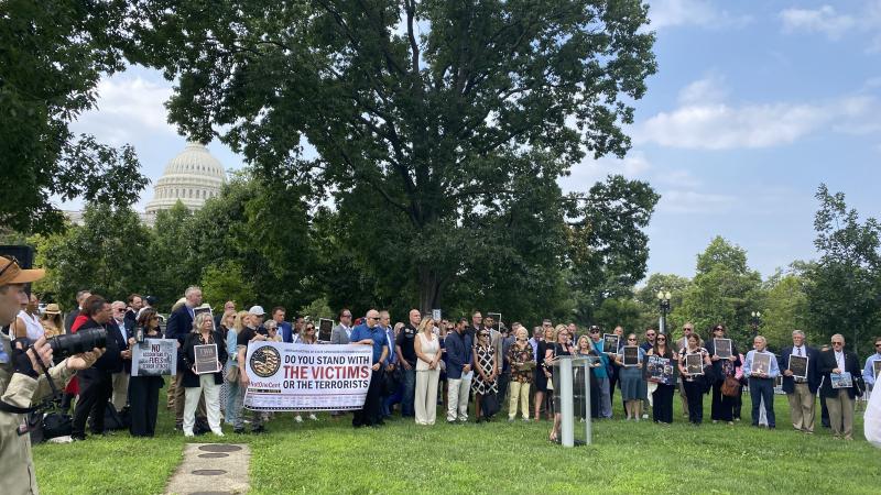 A group of victims and family representatives expressed support for the U.S. Victims of State Sponsored Terrorism Fund on the upper Senate lawn on July 20 in Washington, D.C.
