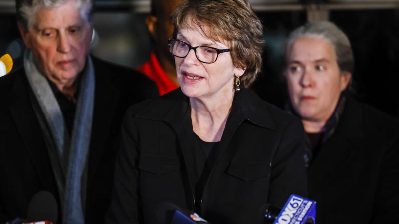 Brown president talking to reporters after December's shooting