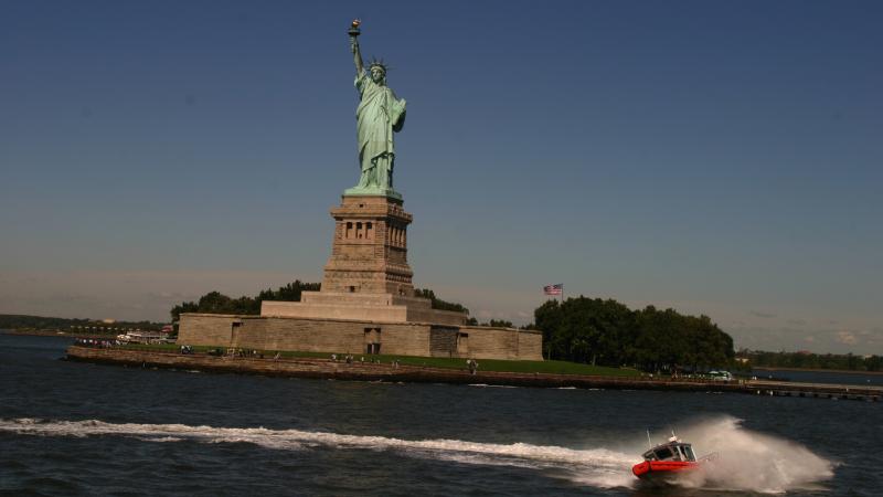 coast guard boat at statue of liberty