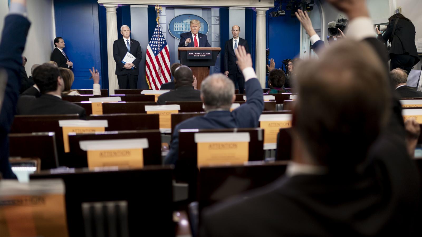 President Donald J. Trump, joined by Vice President Mike Pence and Labor Secretary Eugene Scalia, takes questions from reporters during a coronavirus update briefing Thursday, April 9, 2020, in the James S. Brady Press Briefing Room of the White House. 