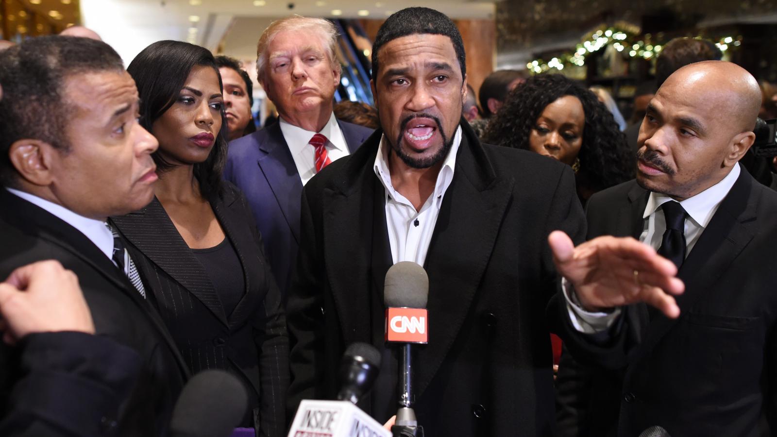  Donald Trump(3rd-L) arrives to speaks to the press with Rev. Darrell Scott(C), senior pastor of the New Spirit Revival Center in Cleveland Heights after meeting with African American pastors at Trump Tower in New York November 30 ,2015. 
